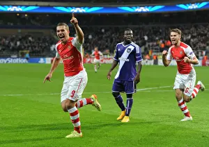 Anderlecht V Arsenal 2014-15 Prints: Lukas Podolski Scores Arsenal's Second Goal vs RSC Anderlecht in 2014-15 UEFA Champions League