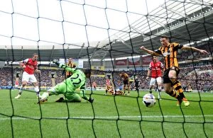 Hull City Collection: Lukas Podolski Scores His Second Goal Against Hull City, Arsenal Leads 3-0