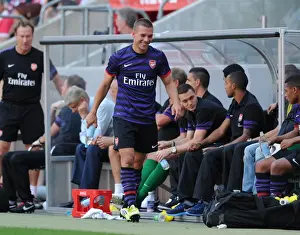 Cologne V Arsenal 2012-13 Prints: Lukas Podolski Shares a Joke with Arsenal Bench During Cologne Friendly, 2012