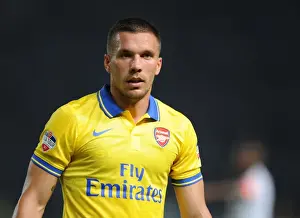 Indonesia Dream Team V Arsenal 2013-14 Prints: Lukas Podolski Shines in Arsenal's Victory against Indonesia All-Stars, 2013