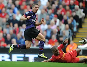 Lukas Podolski Stuns Liverpool: Arsenal's Historic First Goal at Anfield, 2012-13 Premier League