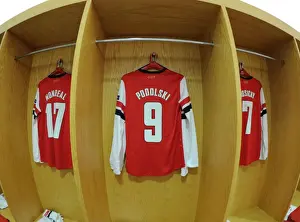 Lukas Podolski's Arsenal Jersey on Display: Arsenal FC vs. FC Bayern Munchen, UEFA Champions League Round of 16