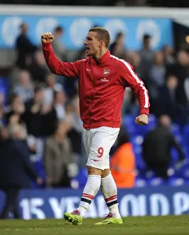 Lukas Podolski's Celebration: Arsenal's Victory Over Tottenham Hotspur in the Premier League, 2014