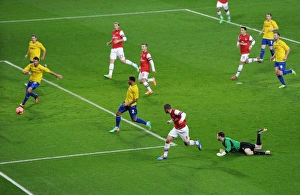 Arsenal V Coventry City - FA Cup 4th Rd 2013-14 Prints: Lukas Podolski's Dramatic Goal: Arsenal's FA Cup Victory Over Coventry City (2014) - Outmaneuvering Joe Murphy