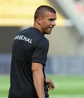 Cologne V Arsenal 2012-13 Prints: Lukas Podolski's Emotional Return: Arsenal Star Reunites with Cologne for Pre-Season Training
