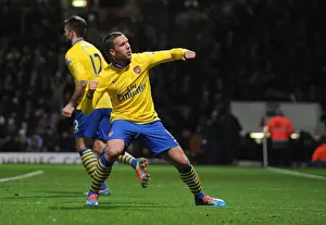 West Ham United V Arsenal 2013-14 Prints: Lukas Podolski's Hat-Trick: Arsenal's Triumph over West Ham United (December 2013)