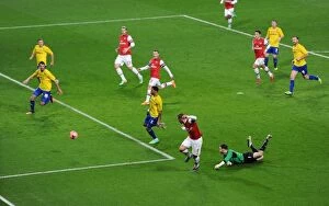 Images Dated 24th January 2014: Lukas Podolski's Stunning FA Cup Goal vs. Joe Murphy (Arsenal vs. Coventry City, 2014)