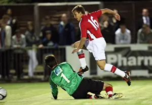 Luke Freeman scores Arsenals 6th goal past Chris Tardiff (Maidenhead)