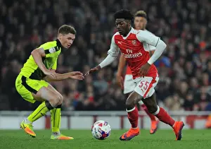 Arsenal V Reading EFL Cup 2016-17 Prints: Maitland-Niles vs. Evans: Intense Face-Off in Arsenal's EFL Cup Battle