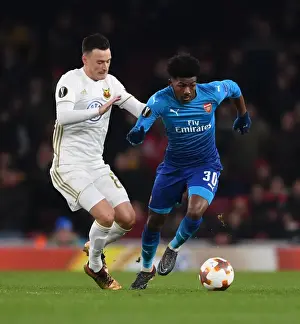 Arsenal V Östersunds FK 2017-18 Prints: Maitland-Niles vs. Hopcutt: A Battle on the Emirates Field - Arsenal vs