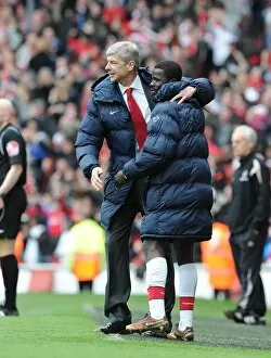 Manager Arsene Wenger celebrates the Arsenal goal with Emmanuel Eboue. Arsenal 1
