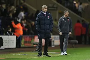 Bolton v Arsenal 2009-10 Collection: Managers : Arsene Wenger (Arsenal) and Owen Coyle (Bolton) during the match
