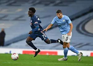 Manchester City V Arsenal 2020-21 Prints: Manchester City vs Arsenal: Bukayo Saka Fouled by Ruben Dias in 2020-21 Premier League Clash