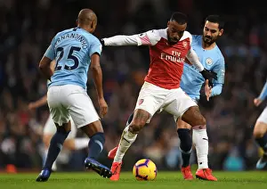 Manchester City V Arsenal 2018-19 Prints: Manchester City vs. Arsenal: Lacazette Clashes with Fernandinho and Gundogan