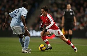 Manchester City v Arsenal 2008-09 Collection: Manchester City's Double Strike: Nasri vs. Vassell in the 3:0 Rout of Arsenal