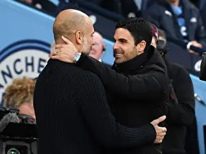 Manchester Rivalry: Arteta and Guardiola Embrace Before Arsenal-City Showdown (Premier League 2022-23)