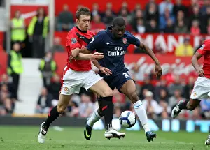 Manchester United Edge Past Arsenal: A Tight Battle Between Abou Diaby and Michael Carrick