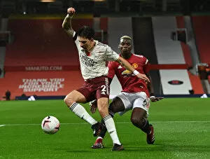 Images Dated 1st November 2020: Manchester United vs Arsenal: Hector Bellerin Penalty Drama in Empty Old Trafford (2020-21)