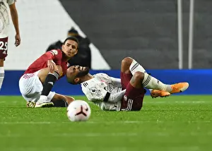 Manchester United V Arsenal 2020-21 Prints: Manchester United vs Arsenal: Lacazette Fouls Greenwood in Empty Old Trafford (2020-21)