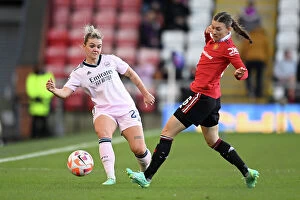 Images Dated 20th April 2023: Manchester United vs. Arsenal: Women's Super League Clash - Arsenal's Laura Wienroither Fends Off