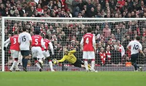 Arsenal v Tottenham 2007-8 Collection: Manuel Almunia (Arsenal) saves a penalty by Robbie Keane (Spurs)