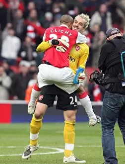 Images Dated 25th December 2007: Manuel Almunia and Gael Clichy (Arsenal) celebrate at the end of the match