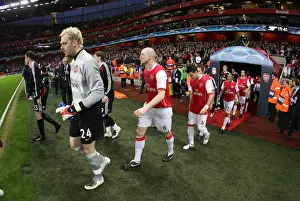 Manuel Almunia and Philippe Senderos (Arsenal) walk out before the match