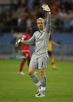 FC Twente v Arsenal Collection: Manuel Almunia waves to the Ardsenal fans after the match