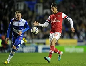Maraooune Chamakh scores his 2nd goal Arsenals 7th as Chris gunter (Reading) closes in