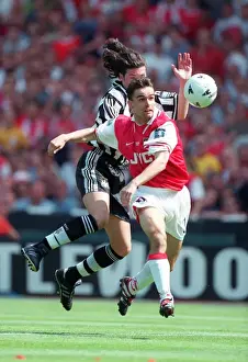 Marc Overmars bursts past the Newacastle defender on his way to scoring the 1st Arsenal Goal
