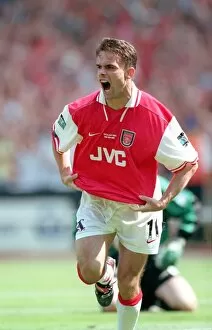 Images Dated 8th April 2005: Marc Overmars celebrates scoring the 1st Arsenal Goal
