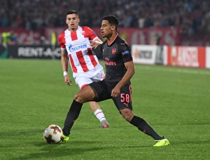 Red Star Belgrade V Arsenal 2017-18 Prints: Marcus McGuane in Action: Arsenal vs. Red Star Belgrade, Europa League 2017-18