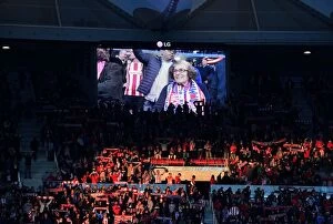 Atletico Madrid v Arsenal 2017-18 Collection: Maria on the big screen. Atletico Madrid 1: 0 Arsenal. Europe League Semi Final, 2nd Leg