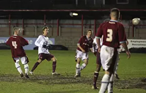 Mark Randall scores Arsenals 2nd goal under pressure from Alex Ray Harvey (Burnley)
