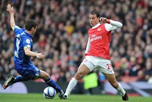 Images Dated 8th January 2011: Marouane Chamakh (Arsenal) Alex Bruce (Leeds). Arsenal 1: 1 Leeds United