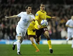 Images Dated 19th January 2011: Marouane Chamakh (Arsenal) Alex Bruce (Leeds). Leeds United 1: 3 Arsenal