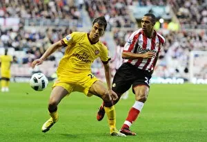 Images Dated 18th September 2010: Marouane Chamakh (Arsenal) Anton Ferdinand (Sunderland). Sunderland 1: 1 Arsenal