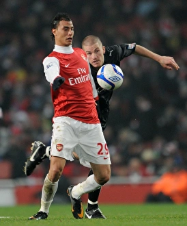 Marouane Chamakh (Arsenal) Ben Chorley (Orient). Arsenal 5:0 Leyton Orient Marouane Chamakh (Arsenal) Ben Chorley (Orient). Arsenal 5:0 Leyton Orient