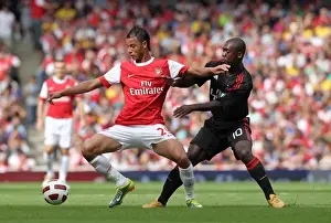Arsenal V AC Milan 2010-11 Prints: Marouane Chamakh (Arsenal) Clarence Seedorf (Milan). Arsenal 1: 1 AC Milan