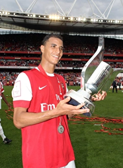 Marouane Chamakh (Arsenal) with Emirates Trophy. Arsenal 3:2 Celtic Marouane Chamakh (Arsenal) with Emirates Trophy. Arsenal 3:2 Celtic