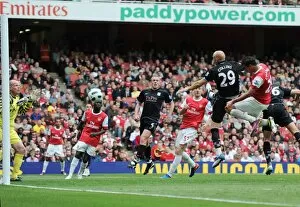 Marouane Chamakh (Arsenal) heads past Aston Villa goalkeeper Brad Friedel but his goal is dissalowed