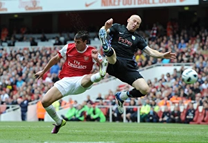 Arsenal V Aston Villa 2010-11 Prints: Marouane Chamakh (Arsenal) James Collins (Villa). Arsenal 1: 2 Aston Villa