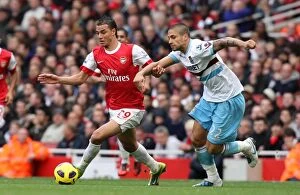 Images Dated 30th October 2010: Marouane Chamakh (Arsenal) Manuel Da Costa (West Ham). Arsenal 1: 0 West Ham United