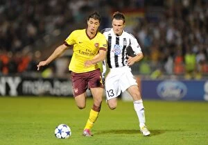 Images Dated 28th September 2010: Marouane Chamakh (Arsenal) Marko Jovanovic (Partizan). Partizan Belgrade 1: 3 Arsenal