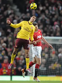 Manchester United V Arsenal 2010-11 Prints: Marouane Chamakh (Arsenal) Michael Carrick (Man United). Manchester United 1: 0 Arsenal