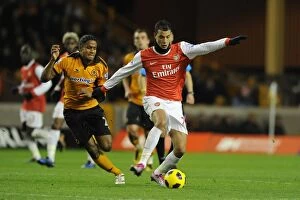 Images Dated 10th November 2010: Marouane Chamakh (Arsenal) Michael Mancienne (Wolves). Wolverhampton Wanderers 0