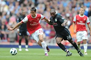 Arsenal V Aston Villa 2010-11 Prints: Marouane Chamakh (Arsenal) Nigel Reo-Coker (Aston Villa). Arsenal 1: 2 Aston Villa