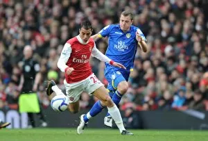 Images Dated 8th January 2011: Marouane Chamakh (Arsenal) Paul Connolly (Leeds). Arsenal 1: 1 Leeds United