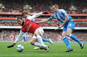 Arsenal V Huddersfield Town - FA Cup Prints: Marouane Chamakh (Arsenal) Peter Clarke (Huddersfield). Arsenal 2: 1 Huddersfield Town
