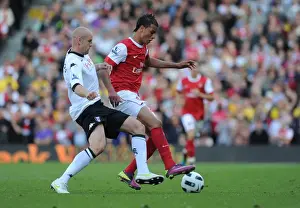Fulham V Arsenal 2010-11 Prints: Marouane Chamakh (Arsenal) Philippe Senderos (Fulham). Fulham 2: 2 Arsenal